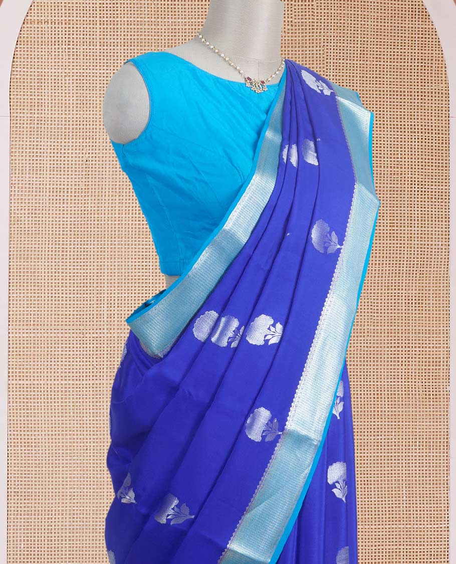 Blue floral zari buttas steeped Mysore silk saree, contrast temple zari border, and scallop zari design pallu