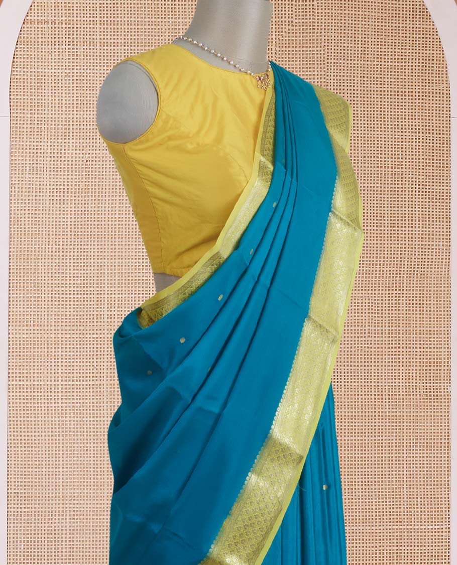 Green zari buttas Mysore silk saree, contrast jaal zari border, and floral jaal design zari woven pallu