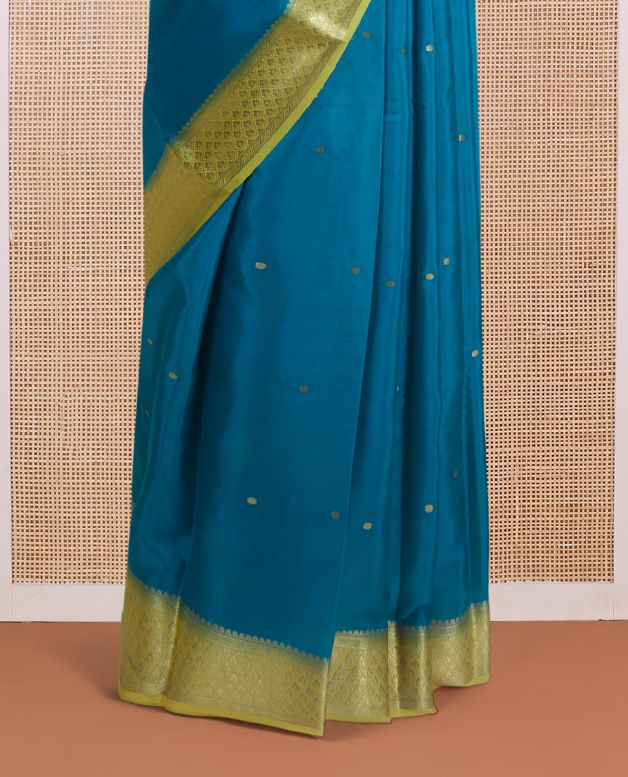 Green zari buttas Mysore silk saree, contrast jaal zari border, and floral jaal design zari woven pallu