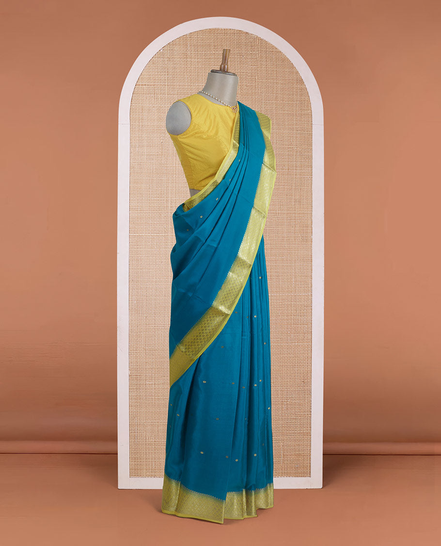 Green zari buttas Mysore silk saree, contrast jaal zari border, and floral jaal design zari woven pallu