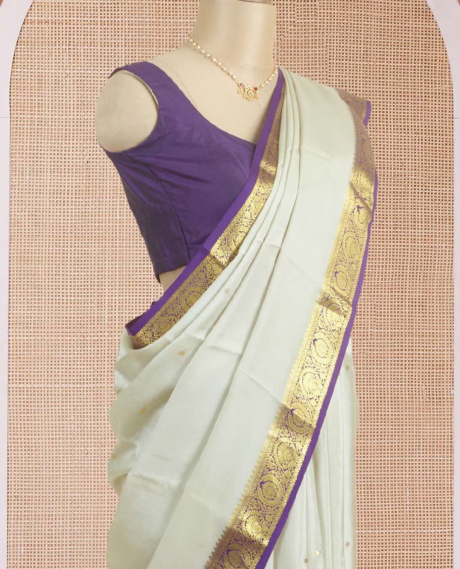 Light sandal zari buttas woven Mysore silk saree, contrast intricate zari border, and jaal patterned pallu
