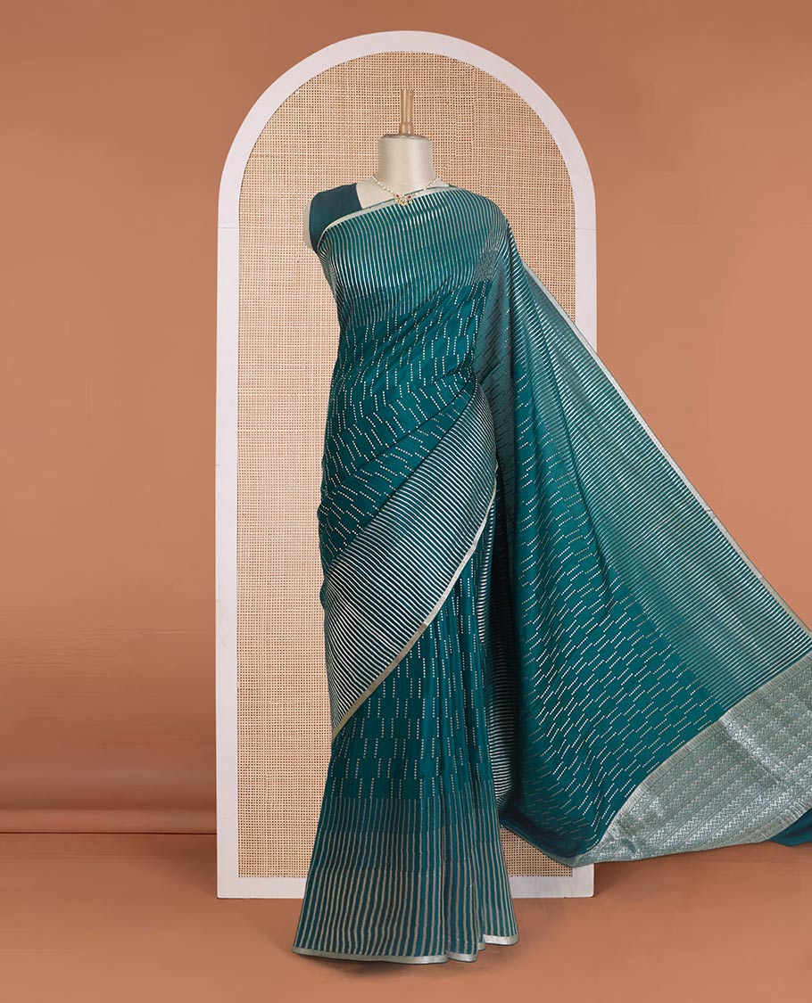 Green zari buttas Mysore silk saree, temple seppu rekku zari border, and chevron design pallu
