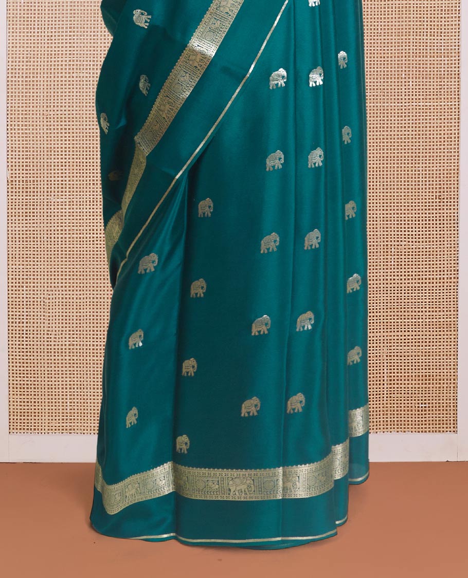 Green zari elephant buttas Mysore silk saree, traditional zari design rettai pettu border, and butta enclosed checked pallu