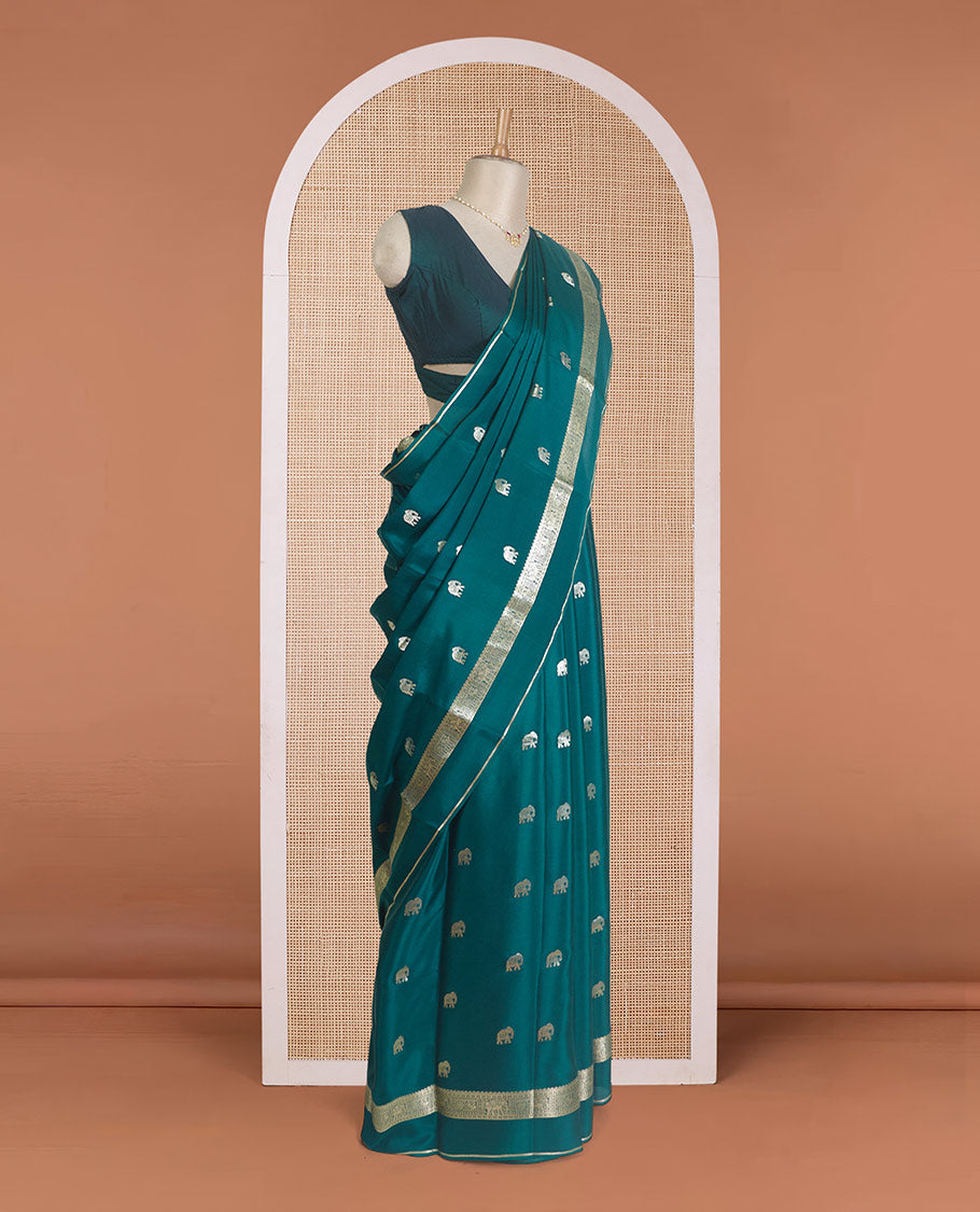 Green zari elephant buttas Mysore silk saree, traditional zari design rettai pettu border, and butta enclosed checked pallu