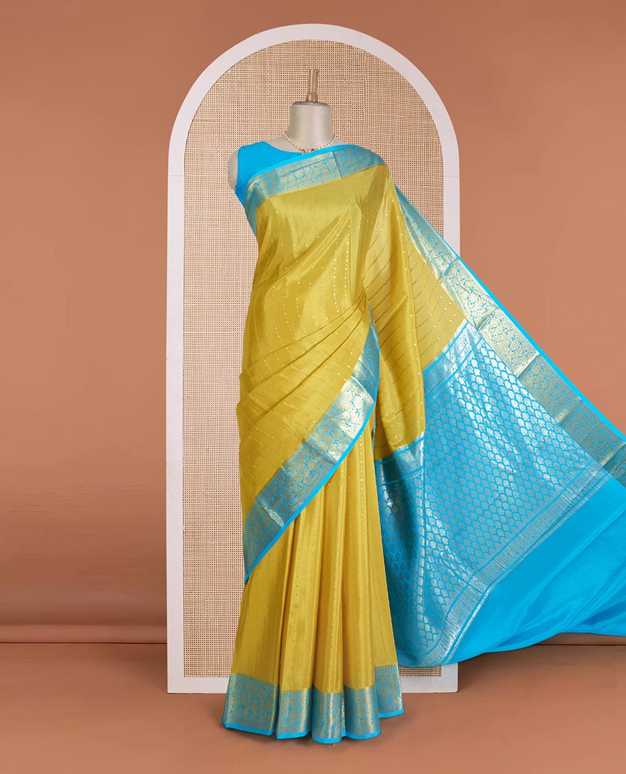 Yellow zari buttas Mysore silk saree, contrast floral zari border, and intricate pallu