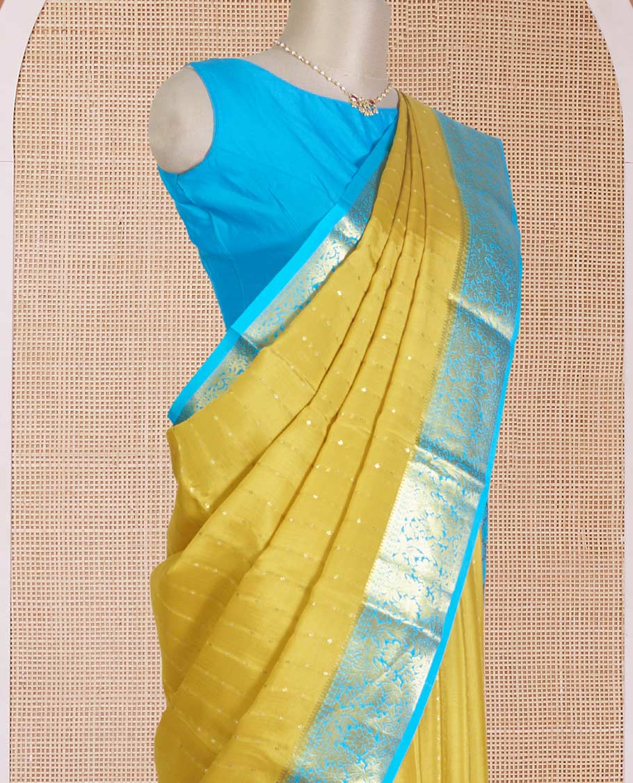 Yellow zari buttas Mysore silk saree, contrast floral zari border, and intricate pallu