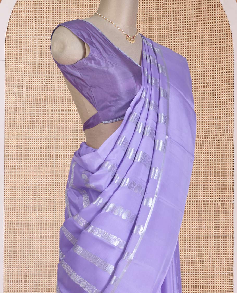 Lavender traditional flora-fauna motifs steeped with Mysore silk saree, self-border, and intricate pallu