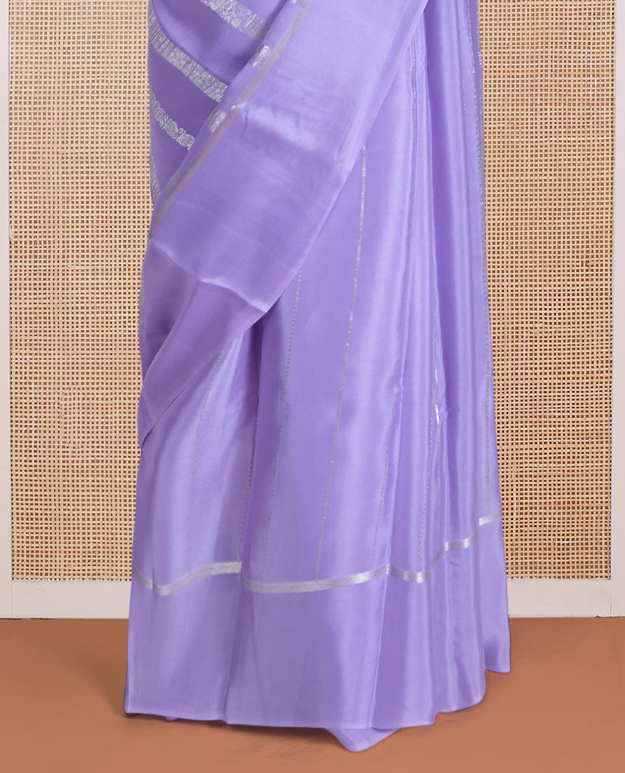 Lavender traditional flora-fauna motifs steeped with Mysore silk saree, self-border, and intricate pallu