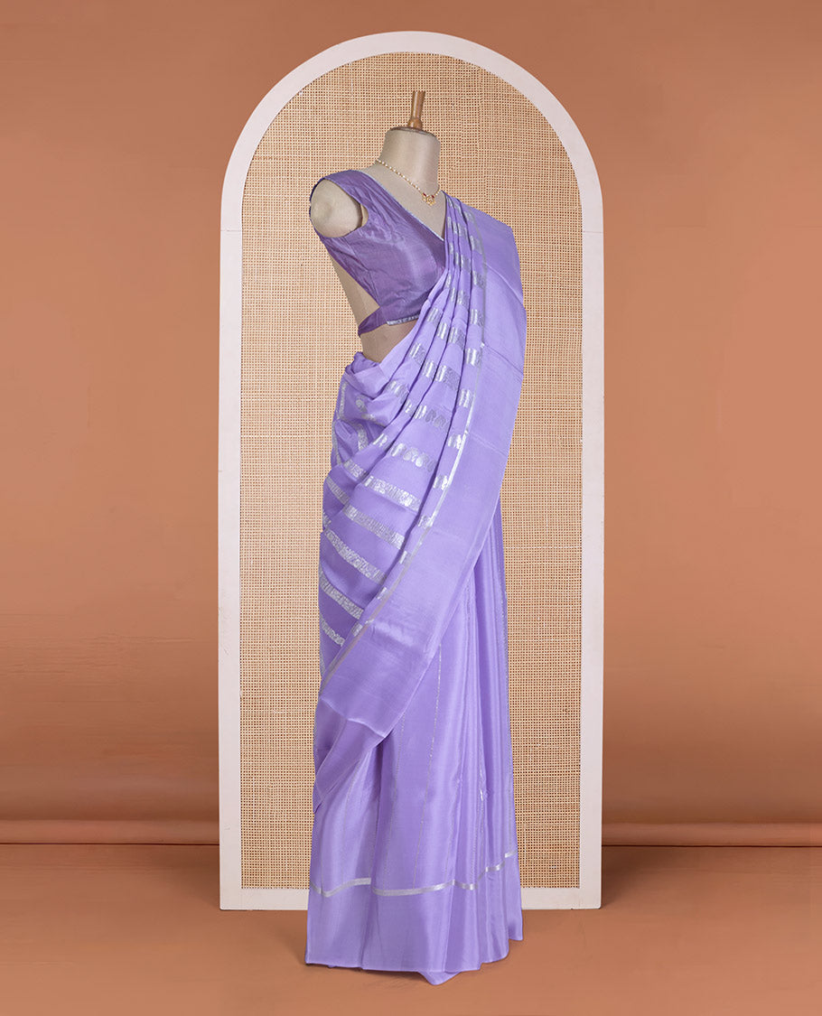 Lavender traditional flora-fauna motifs steeped with Mysore silk saree, self-border, and intricate pallu