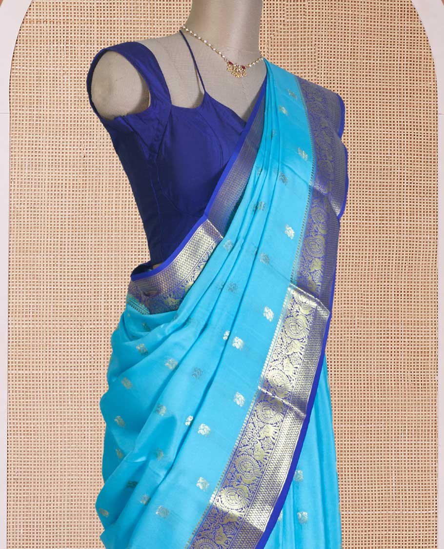 Blue peacock zari buttas Mysore silk saree, contrast traditional peacock border, and pallu steeped with peacock motifs