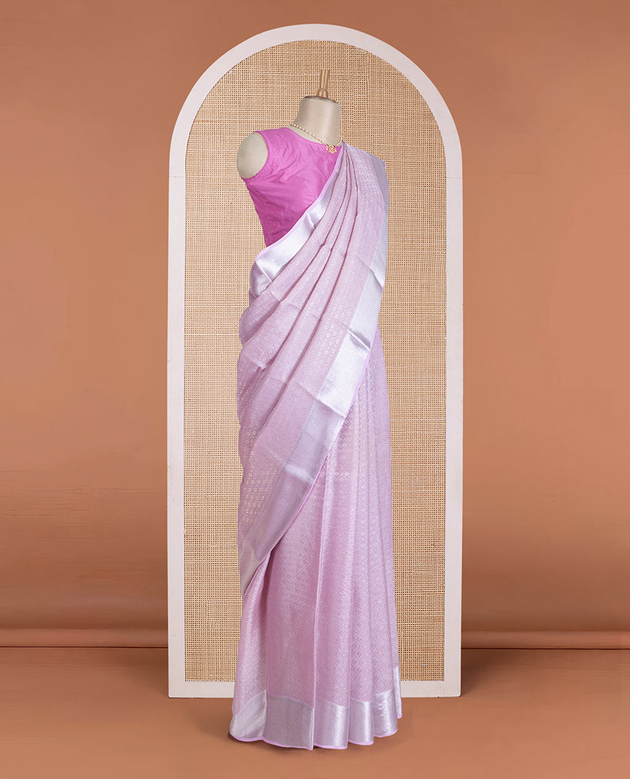 Pale lavender jacquard Mysore silk saree, traditional zari border, and jaal pallu