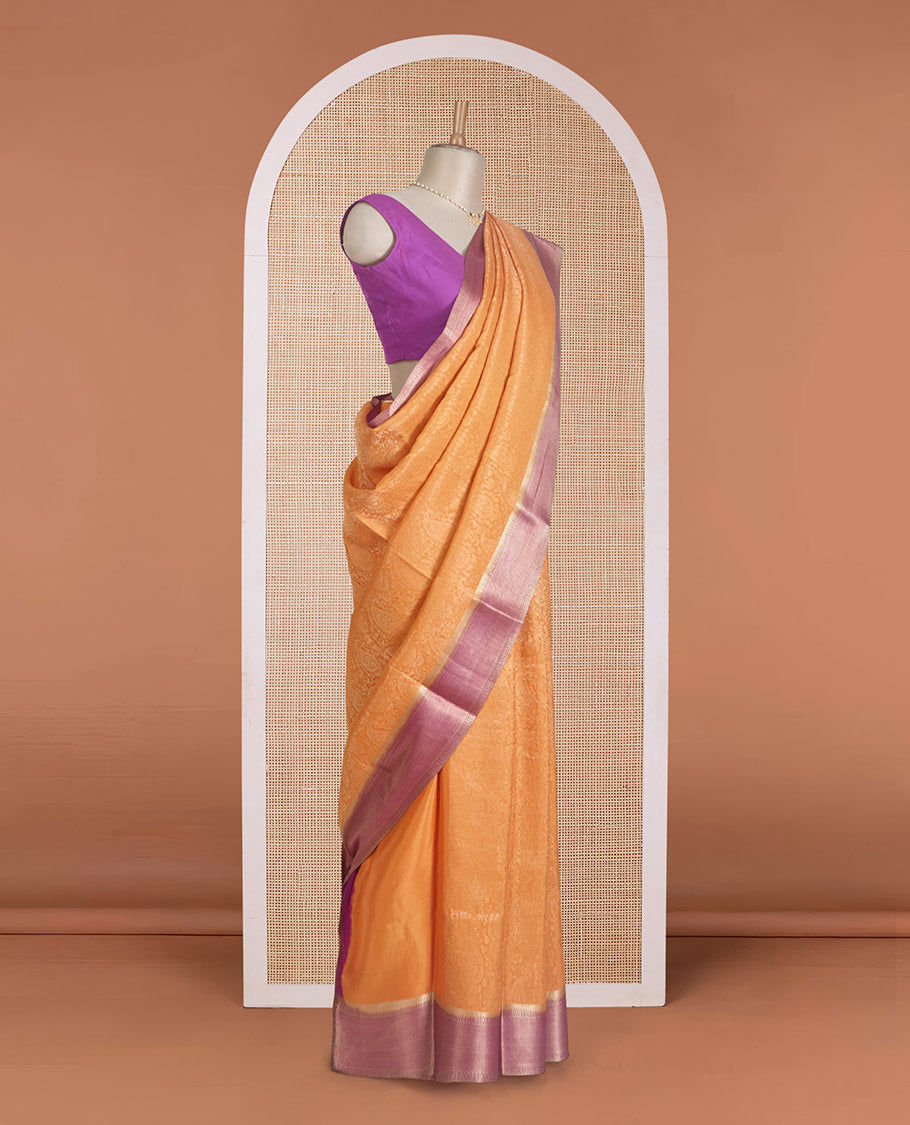Orange jacquard Mysore silk saree, contrast traditional zari border, and chevron design pallu