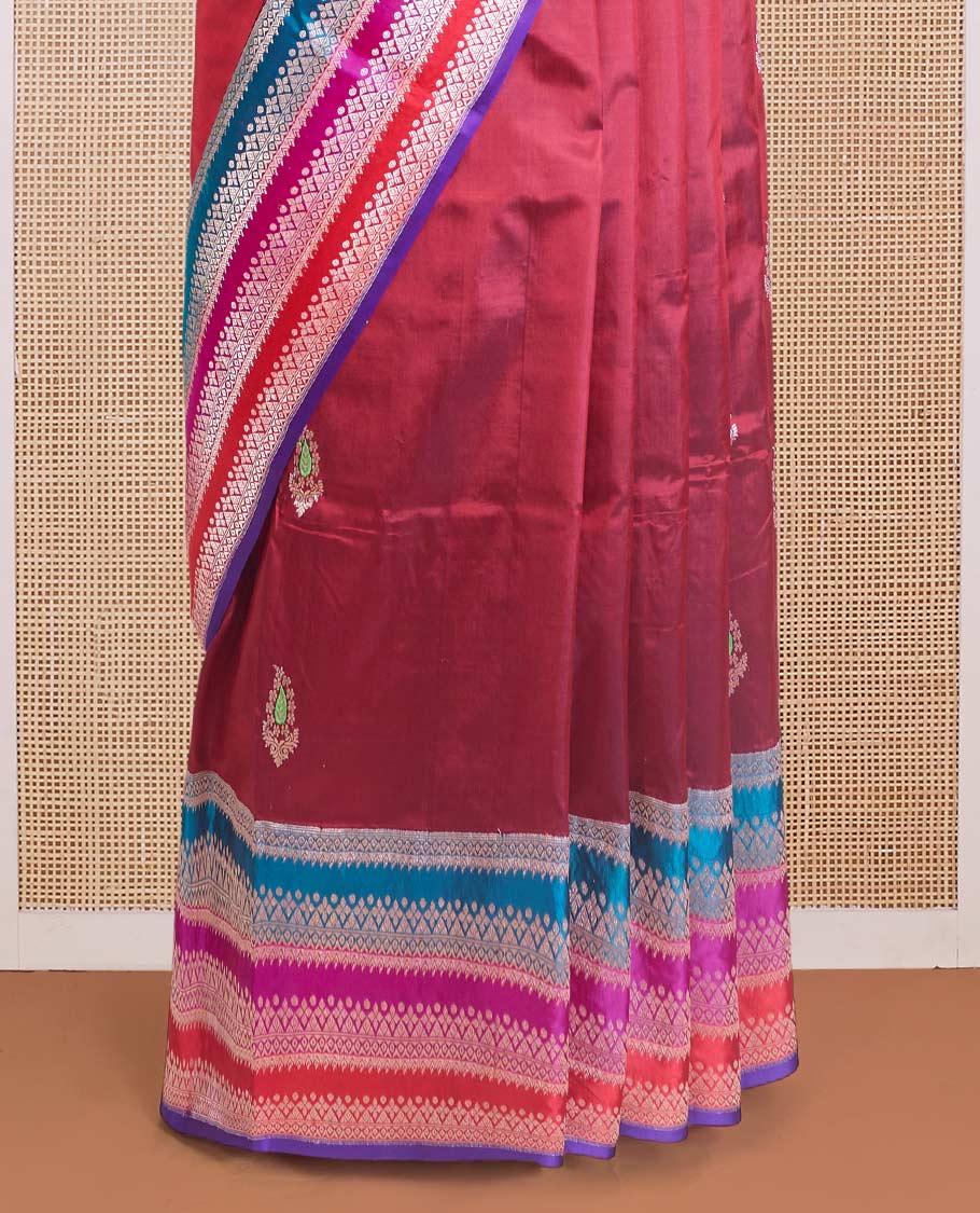 Maroon floral buttas Banarasi kathan silk saree, contrast traditional zari design meenakari border, and intricate pallu