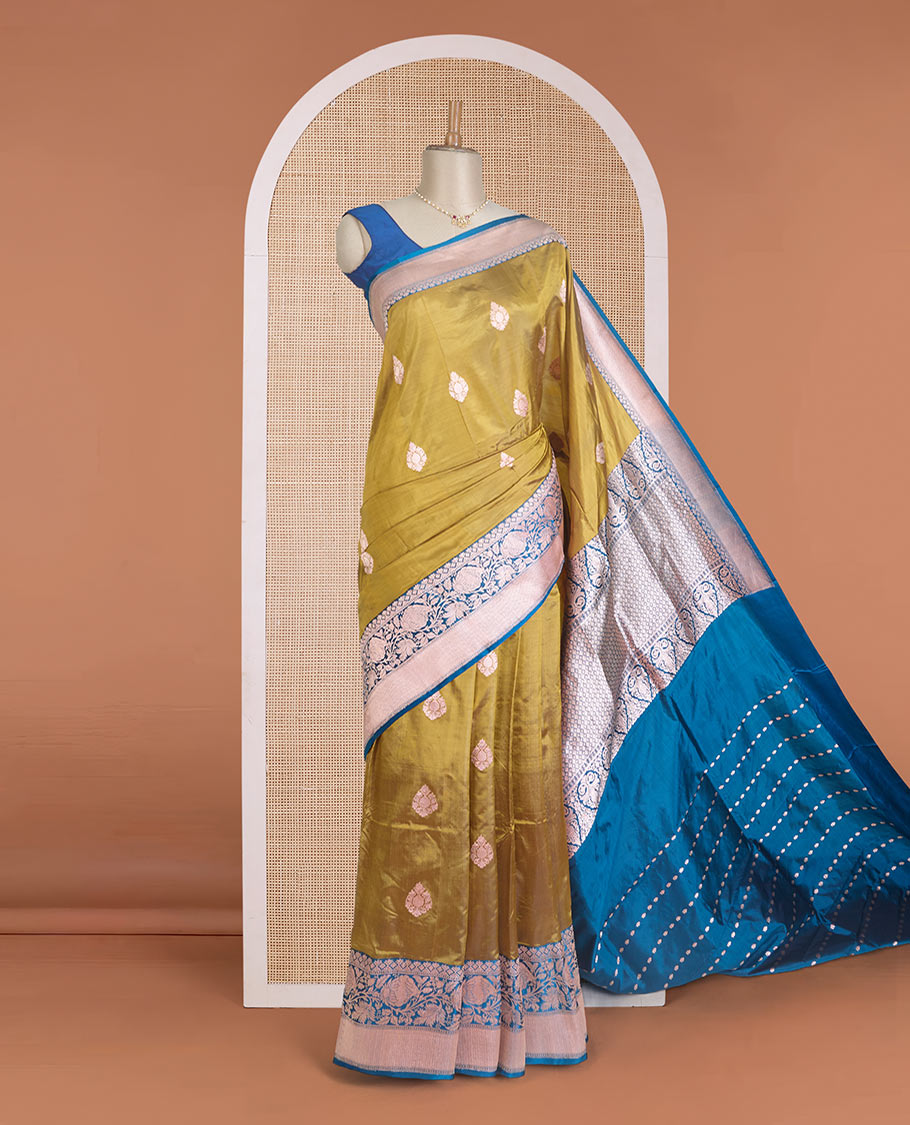 Gold zari buttas Banarasi kathan silk saree, contrast traditional zari floral creeper border, and pallu features dobby style buttas