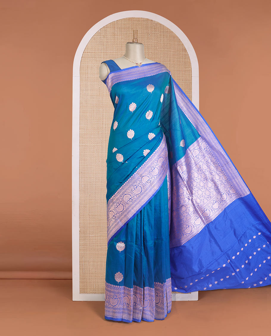Ramar blue zari buttas Banarasi kathan silk saree, contrast traditional zari floral creeper border, and pallu features dobby style buttas