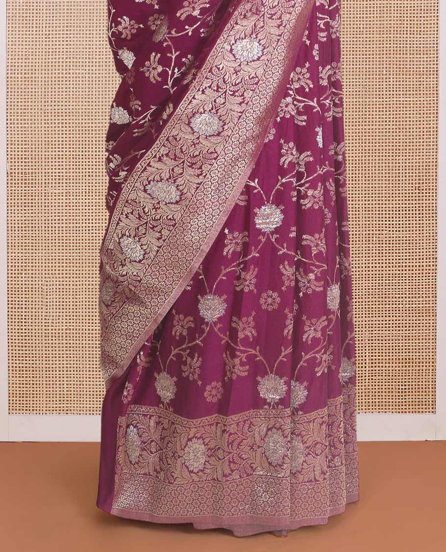Maroon floral jaal jacquard fancy crepe saree, floral creeper zari border, and pallu of floral jaal design