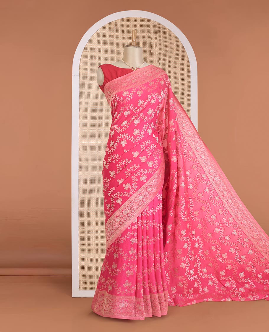 Fushcia pink floral jaal jacquard fancy crepe saree, floral creeper zari border, and pallu of floral jaal design