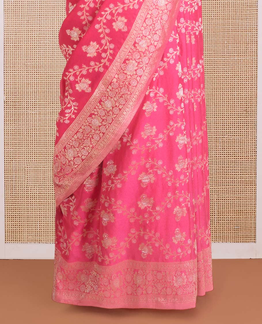 Fushcia pink floral jaal jacquard fancy crepe saree, floral creeper zari border, and pallu of floral jaal design