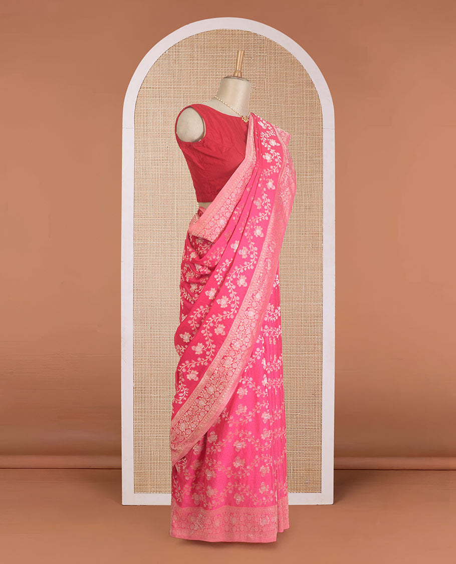 Fushcia pink floral jaal jacquard fancy crepe saree, floral creeper zari border, and pallu of floral jaal design