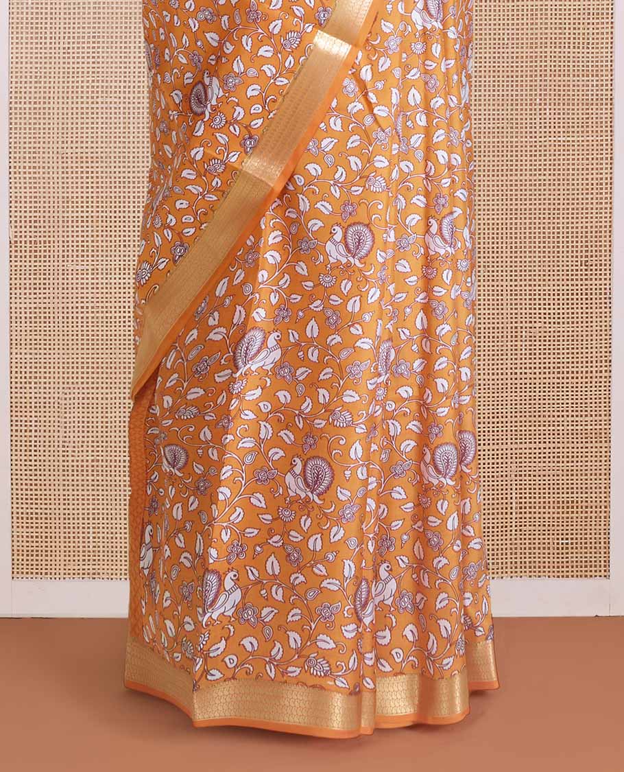 Orange kalamkari floral vine, and peacock printed silk saree, paisley zari motifs border, and striped pallu