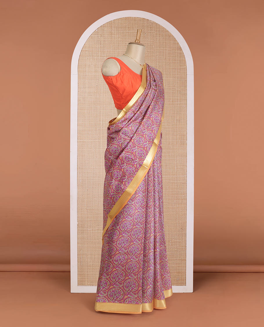 Pink intricate designs printed silk saree, contrast paisley zari motifs border, and printed pallu