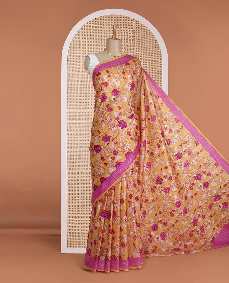 Yellow floral vine printed silk saree, contrast border, and pallu steeped with traditional designs