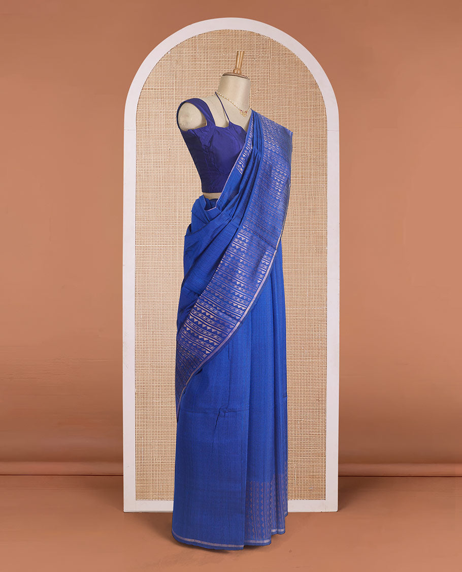 Blue plain dupion silk saree, zari border and pallu of temple, and geometric designs