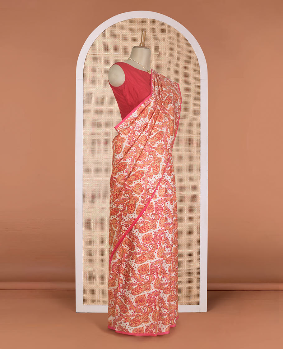 Borderless orange paisley motifs printed silk saree, intricately printed pallu