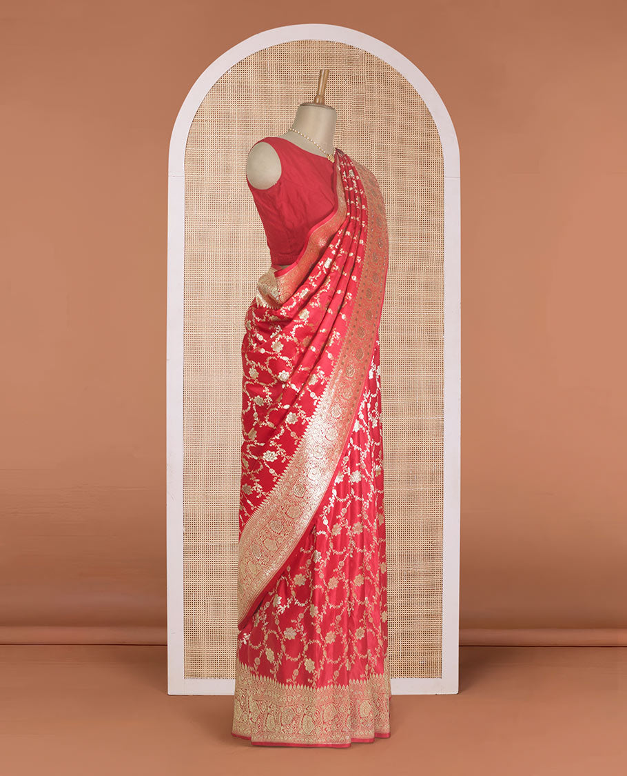 Red floral jaal jacquard with stone work Banaras Satin silk saree, floral creeper zari border, and pallu of thilkam design
