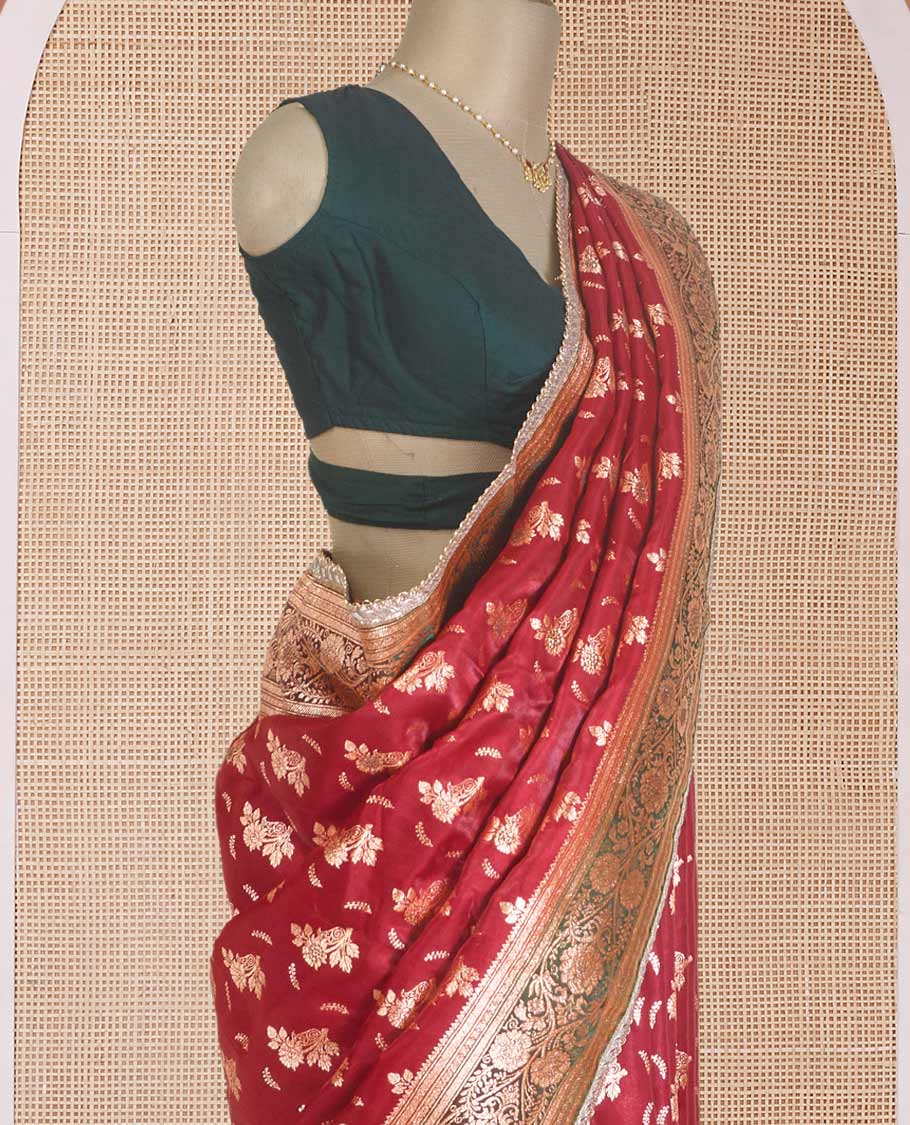 Red floral buttas with stone work Banaras Nylon silk saree, contrast floral creeper zari border, and Mughal-style intricately zari woven pallu