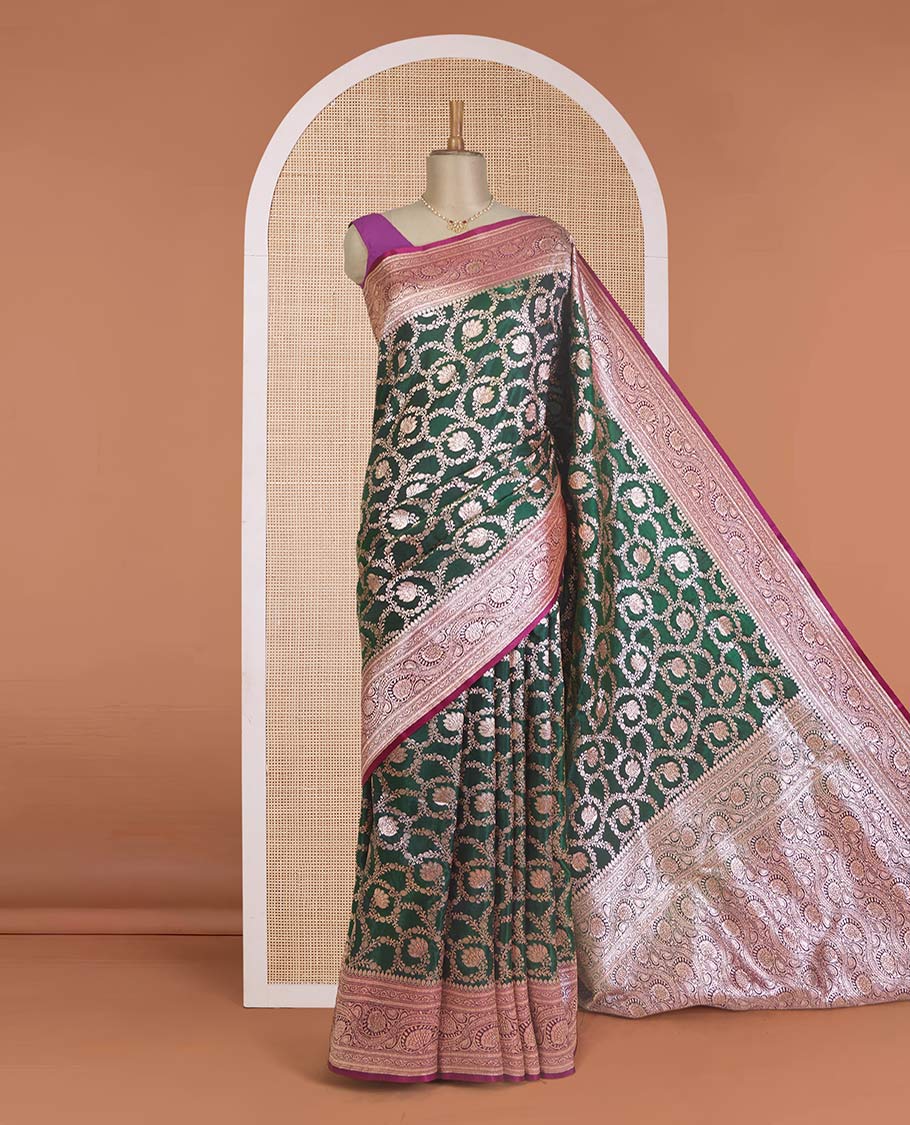 Green floral jaal jacquard with stone work Banaras Nylon silk saree, contrast floral creeper zari border, and intricately designed pallu