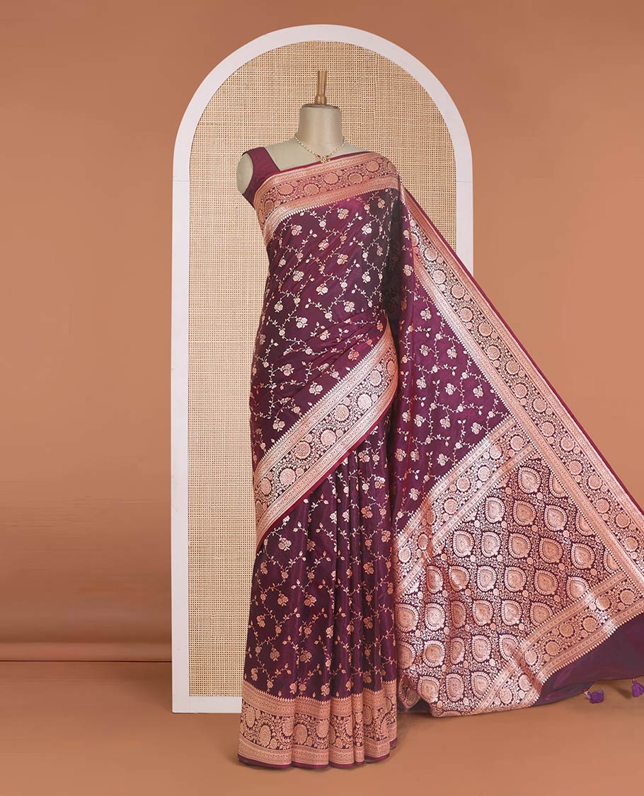 Wine purple floral jaal jacquard with stone work Banaras Nylon silk saree, traditional zari border of floral creeper designs, and intricate pallu