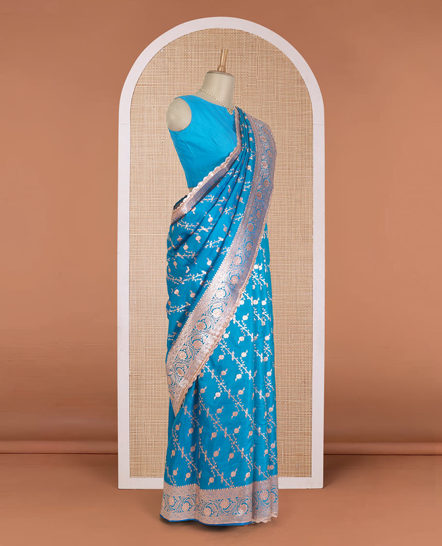 Azure blue diagonal floral stripes with stone work Banaras Nylon silk saree, traditional zari woven border of scallop lacework and stonework, and intricate pallu