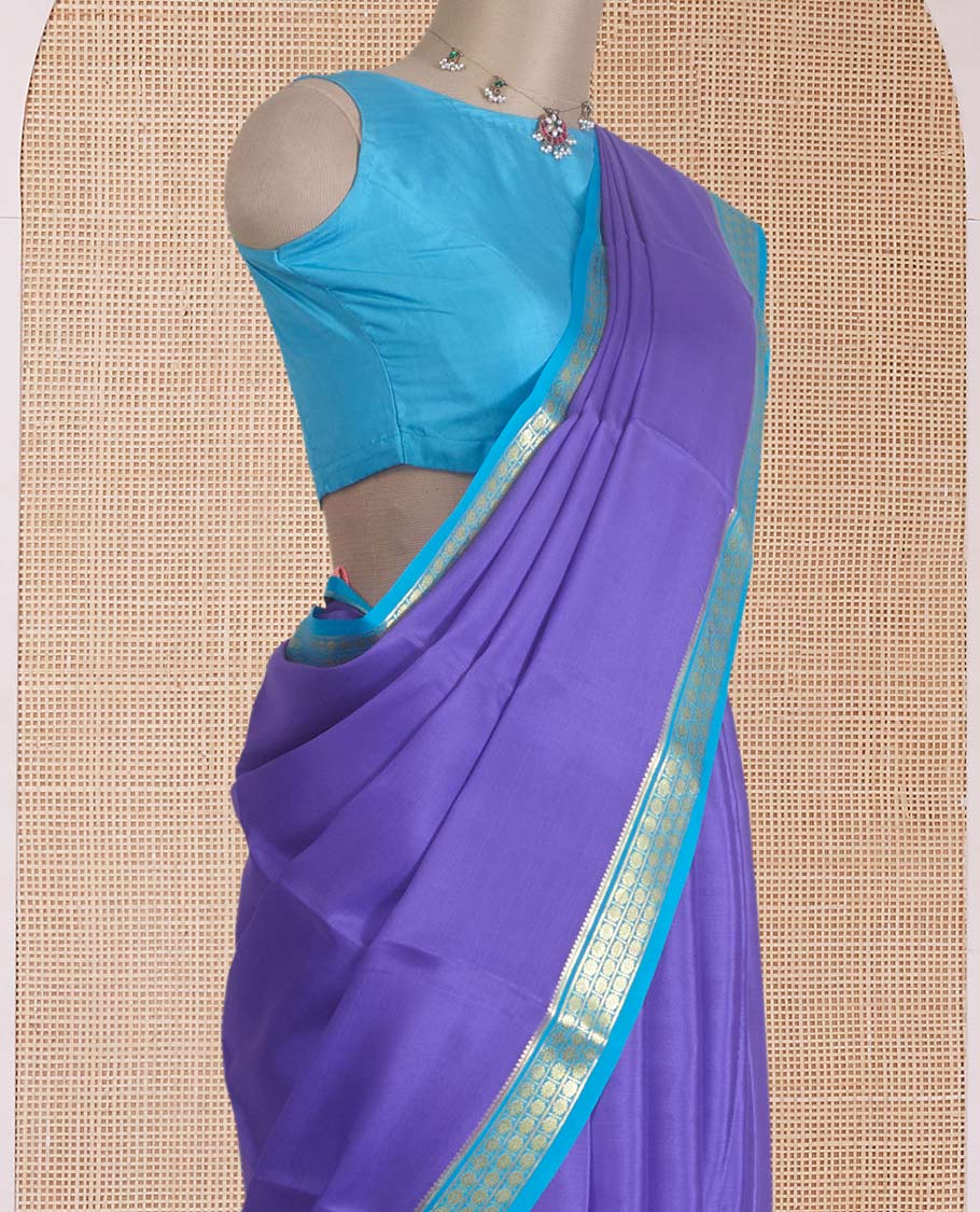 Violet plain Mysore silk saree, contrast floral zari design border, and zari striped pallu