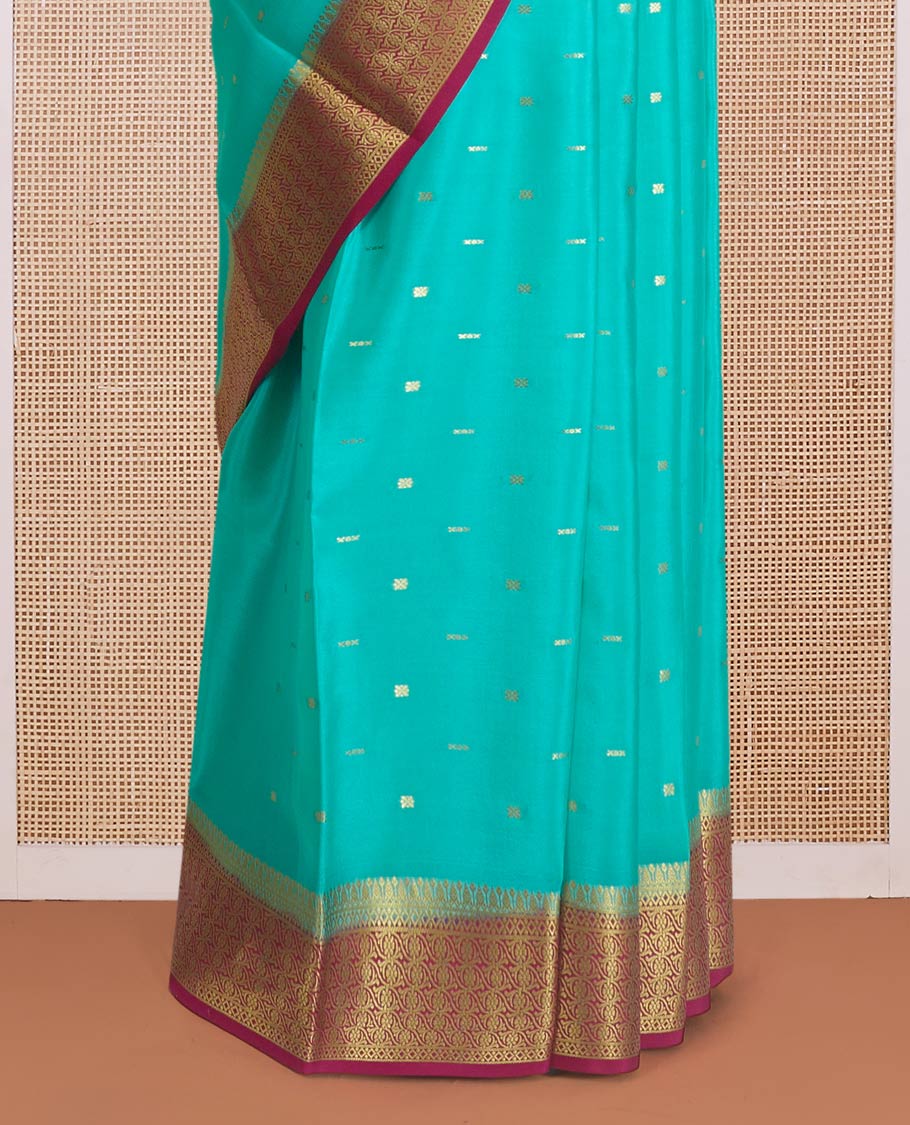 Green zari buttas Mysore silk saree, contrast floral design border, and pallu of jaal design