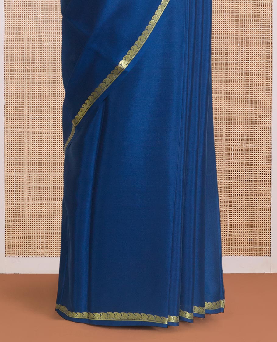 Navy blue plain Mysore silk saree, zari border of paisleys, and zari striped pallu