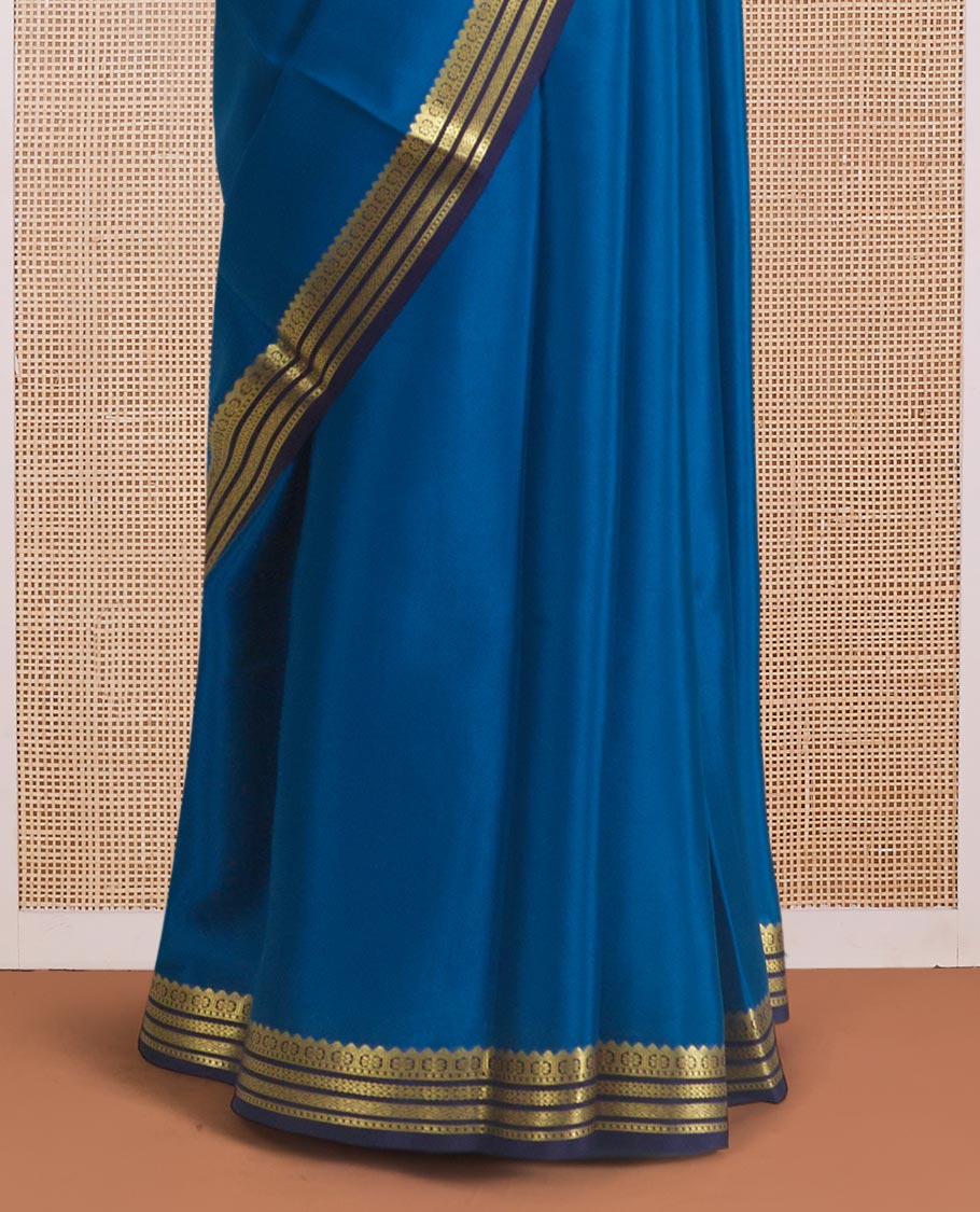 Blue plain Mysore silk saree, contrast traditional zari border, and zari striped pallu