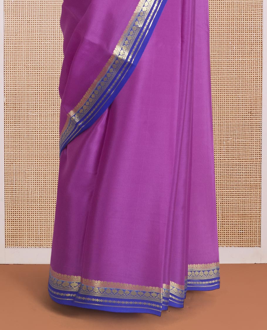 Rani pink plain Mysore silk saree, contrast traditional zari border, and zari striped pallu