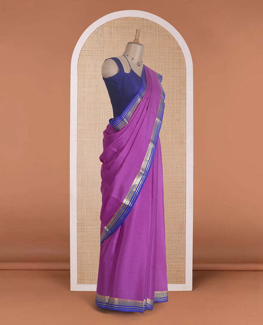 Rani pink plain Mysore silk saree, contrast traditional zari border, and zari striped pallu