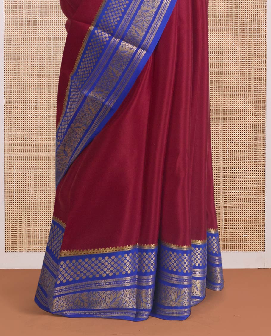 Maroon plain Mysore silk saree, contrast traditional zari designs steeped border, and zari striped pallu