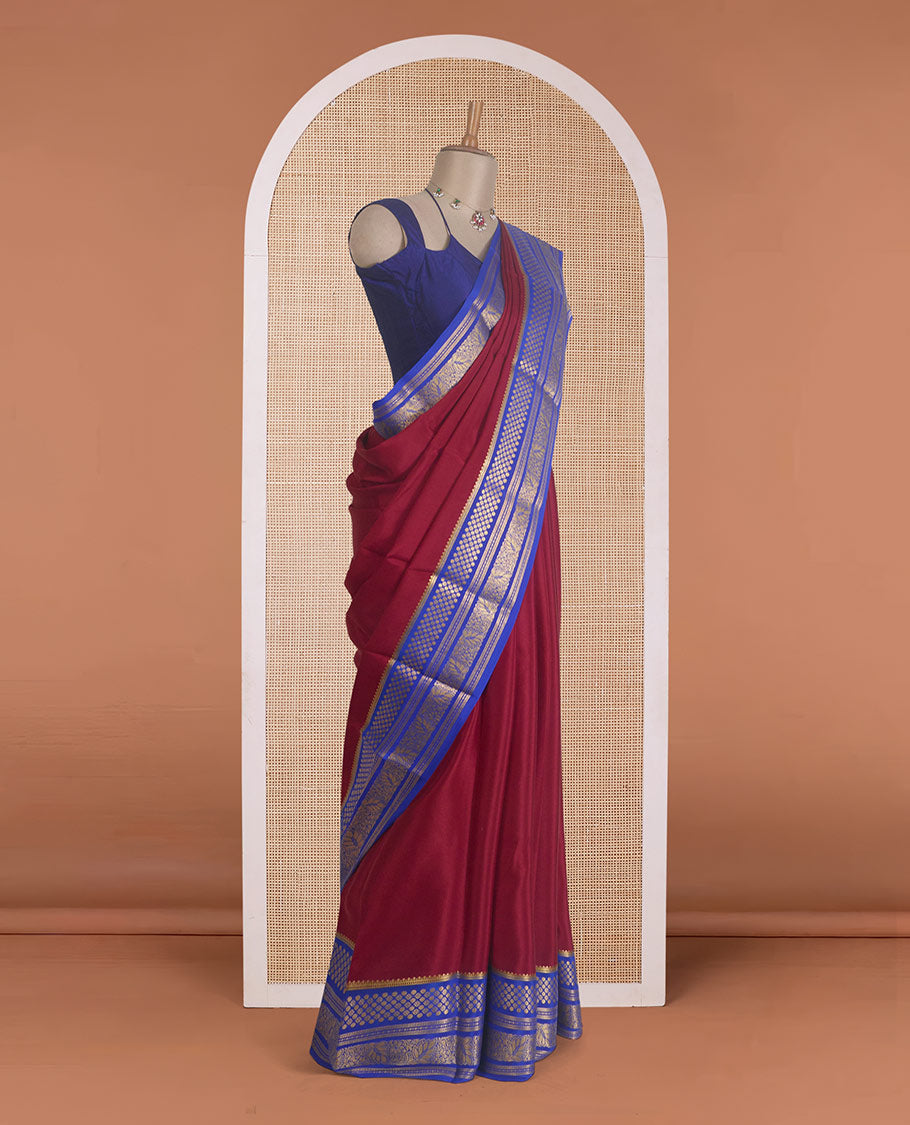 Maroon plain Mysore silk saree, contrast traditional zari designs steeped border, and zari striped pallu
