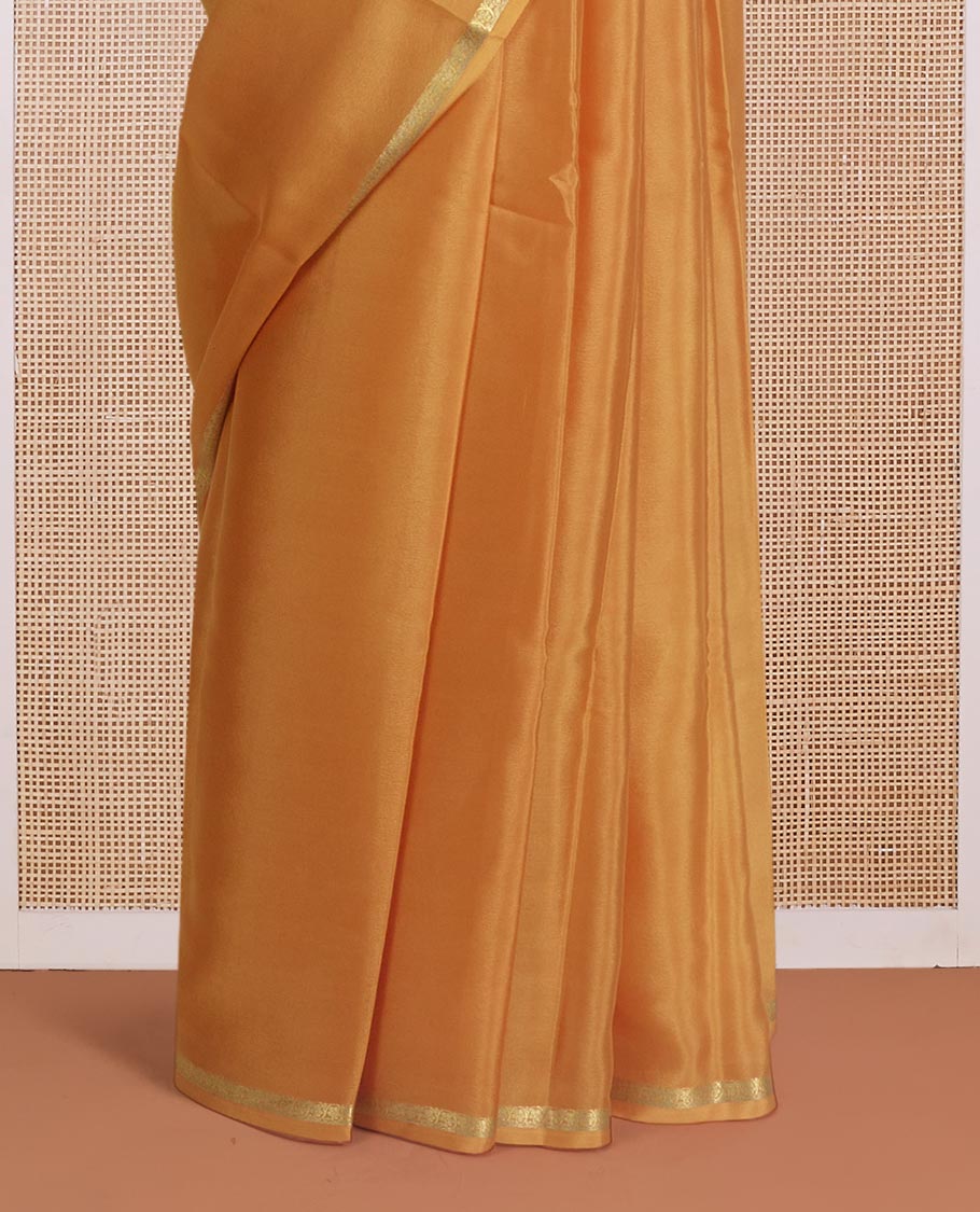 Mustard plain Mysore silk saree, traditional zari border, and zari striped pallu