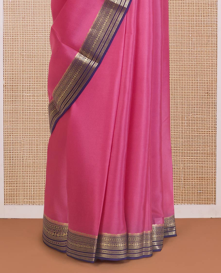 Pink plain Mysore silk saree, contrast traditional zari design steeped border, and zari striped pallu