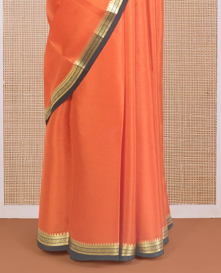 Orange plain Mysore silk saree, contrast traditional zari design border, and zari striped pallu