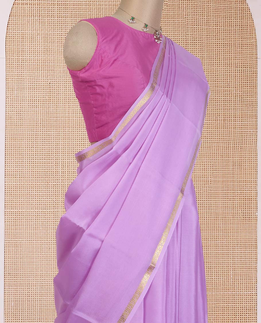 Violet plain Mysore silk saree, floral creeper zari border, and zari striped pallu