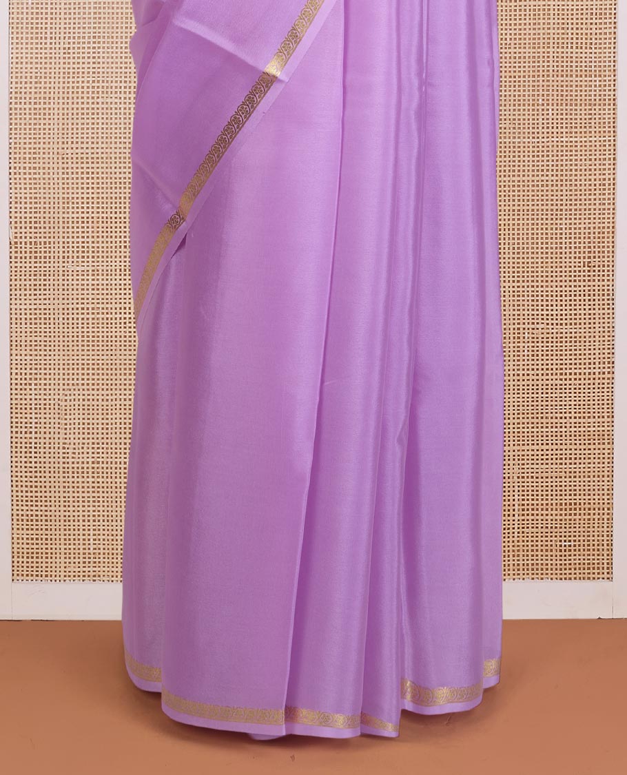 Violet plain Mysore silk saree, floral creeper zari border, and zari striped pallu