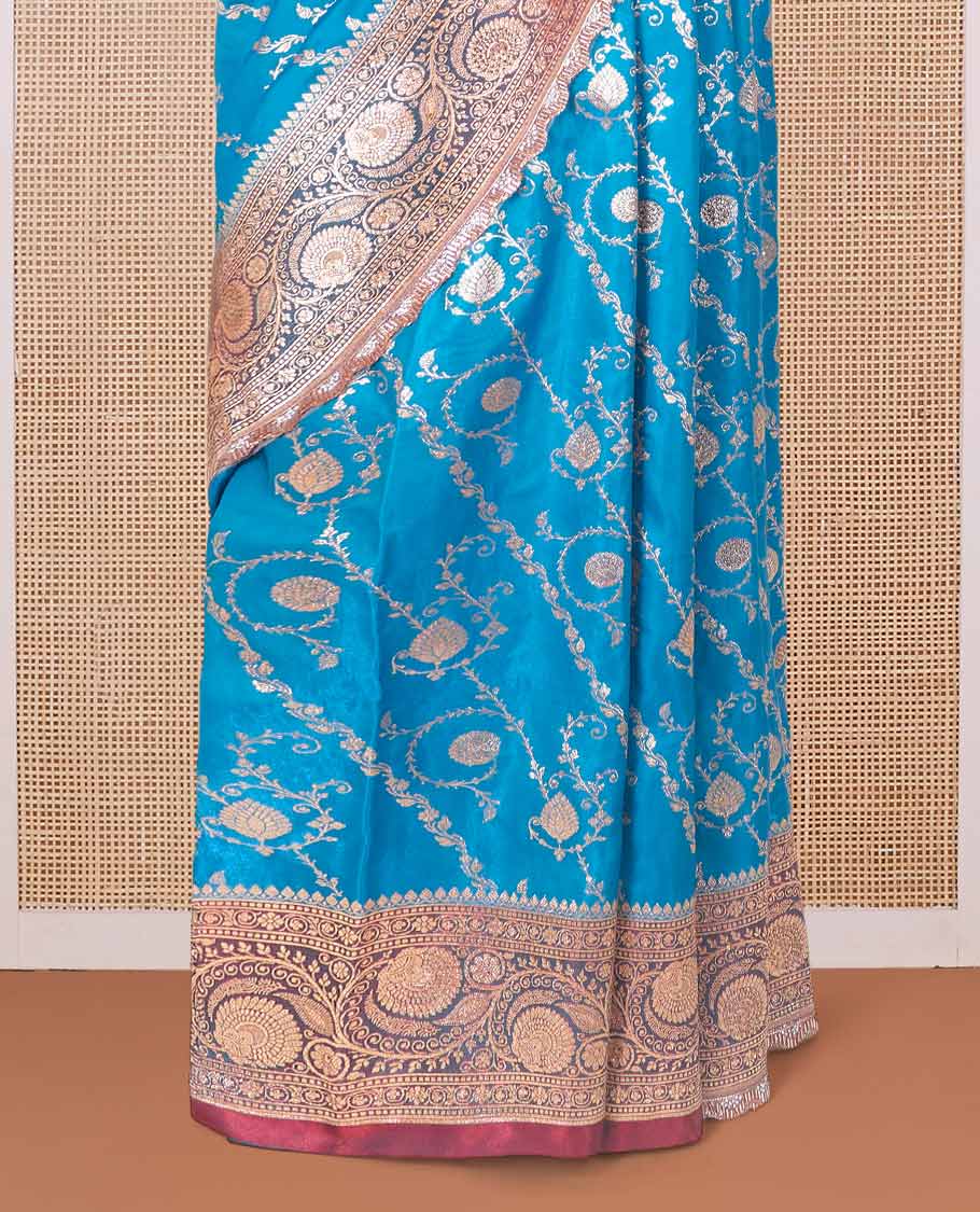 Blue jacquard with micro stonework banaras nylon silk saree, contrast floral creeper zari and stonework border, and intricately zari woven pallu