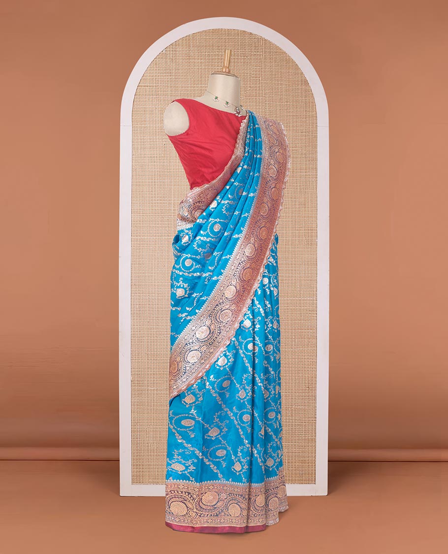 Blue jacquard with micro stonework banaras nylon silk saree, contrast floral creeper zari and stonework border, and intricately zari woven pallu