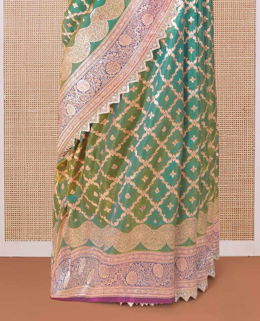 Green jaal jacquard with micro stonework banaras nylon silk saree, contrast floral creeper zari and stone work border, and intricately zari woven pallu