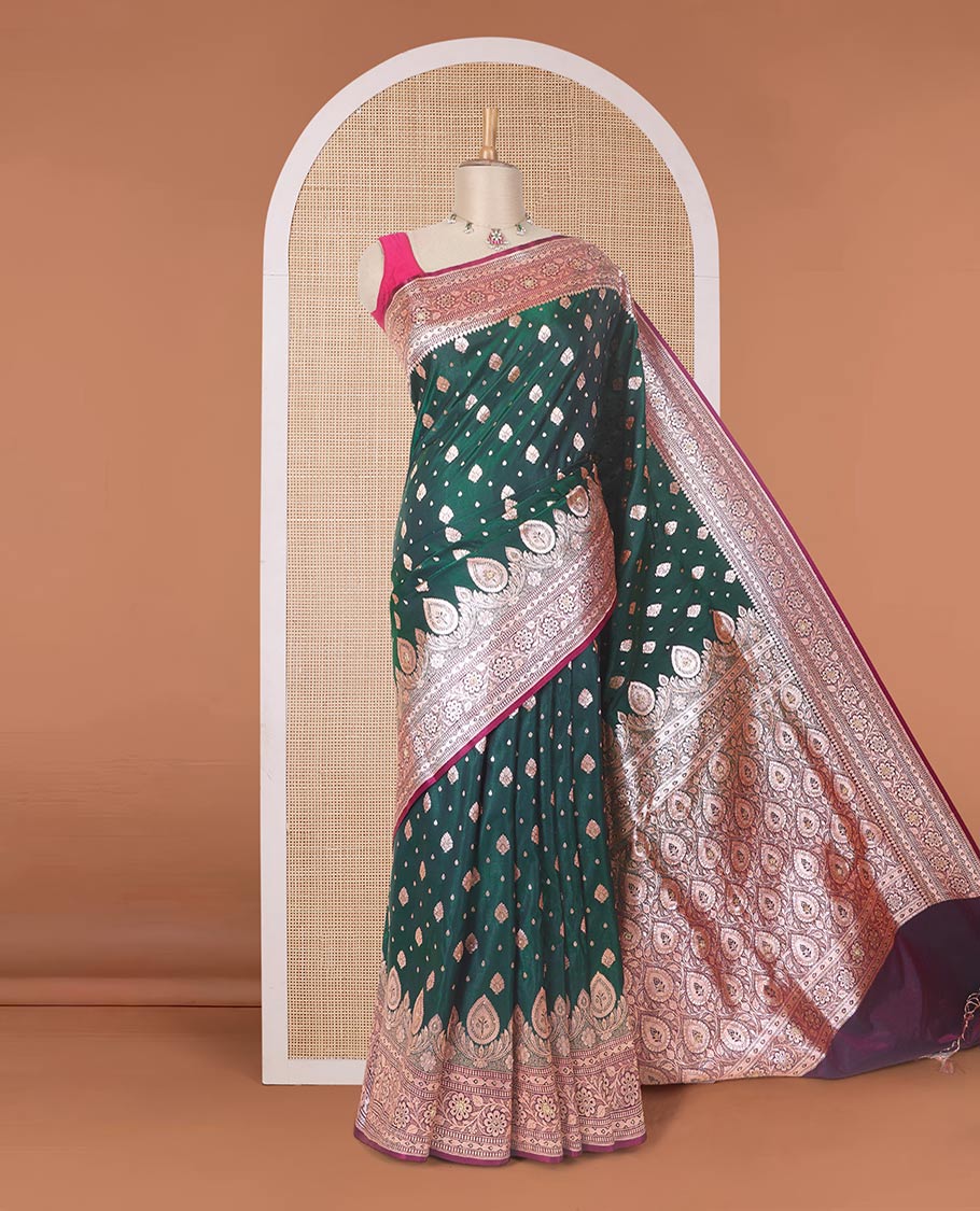 Dark green zari buttas with micro stonework banaras nylon silk saree, contrast floral creeper zari and stone work border, and zari woven jaal pallu